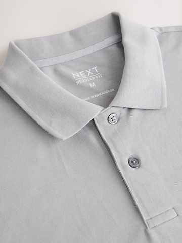 Next Poloshirt in Grau