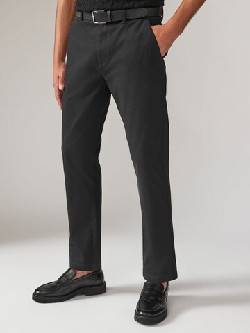 Slimfit Pantaloni chino di Next in nero: frontale