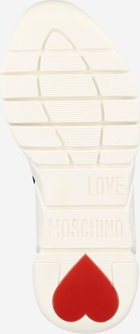 Sneaker alta 'CALZA' di Love Moschino in nero