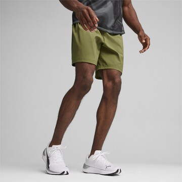 PUMA Regular Workout Pants 'Favourite' in Green: front