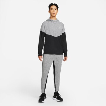 NIKE Slimfit Sporthose in Grau