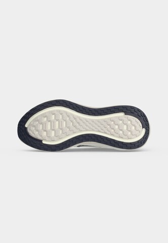 NIKE Обувь для бега 'Vomero Plus' в Серый: низ