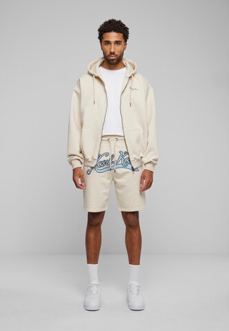 Karl Kani Regular Shorts in Beige