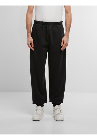 Loosefit Pantalon de sport ' ' Karl Kani en noir