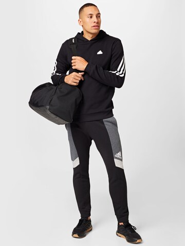 ADIDAS SPORTSWEAR Zwężany krój Spodnie sportowe 'Essentials Colorblock' w kolorze czarny