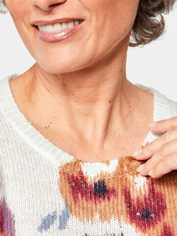Goldner Pullover in Mischfarben