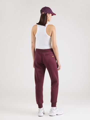 G-STAR Tapered Housut 'Premium Core 2.0' värissä punainen
