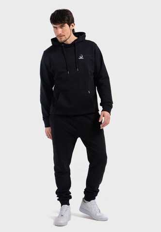 Oldskull Tapered Pants 'Basic Oldskull 25 Logo' in Black