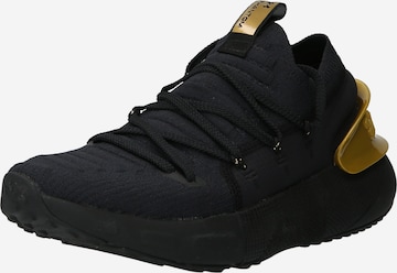 UNDER ARMOUR Athletic Shoes in Black: front