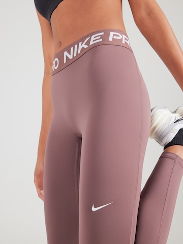 NIKE Skinny Sportnadrágok 'NP 365' - lila
