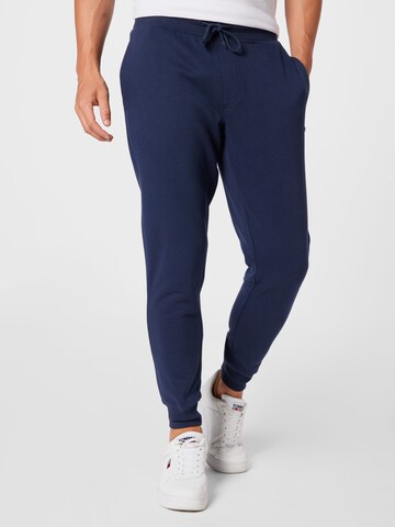 Tommy Jeans Tapered Broek in Blauw: voorkant