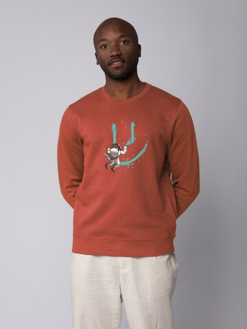 Watapparel Sweatshirt ' Graffiti Astronaut ' in Bruin: voorkant