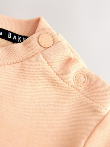 Tutina / body per bambino di Baker by Ted Baker in arancione