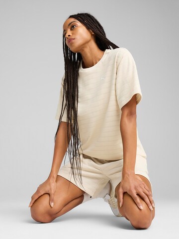 PUMA Performance shirt 'Ess' in Beige