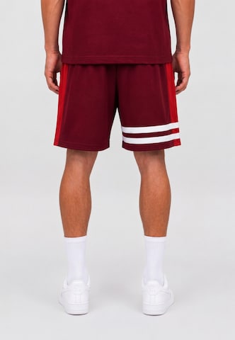 Unfair Athletics Regular Trousers 'Dmwu' in Red