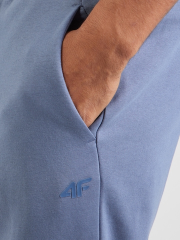 Tapered Pantaloni sport de la 4F pe albastru