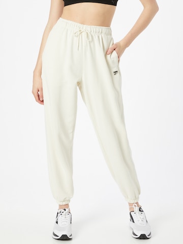 PUMA Workout Pants 'PUMAxABOUT YOU' in Beige: front