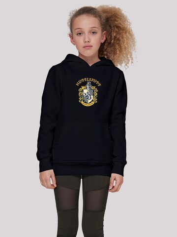F4NT4STIC Sweatshirt 'Harry Potter Hufflepuff Crest' in Schwarz: predná strana