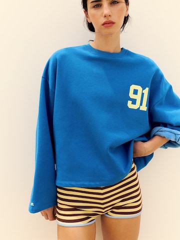 Sweat-shirt 'PACIFIC 91' Pull&Bear en bleu : devant