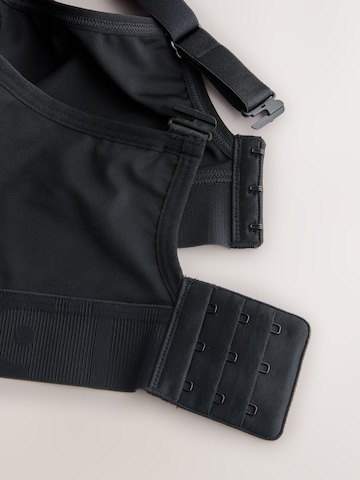 Next Бюстие Спортен сутиен в черно