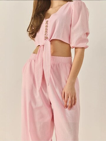 Completo pantalone di Bianco Lucci in rosa