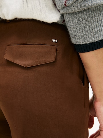 TOMMY HILFIGER Wide Leg Hose in Braun