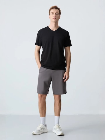 Wide leg Pantaloni di Tommy Life in grigio