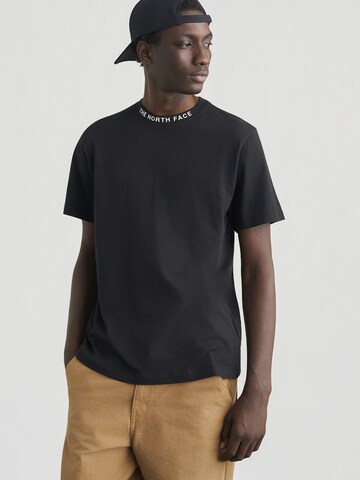 THE NORTH FACE T-shirt 'ZUMU' i svart: framsida