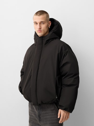 Bershka Winter jacket in Black: front