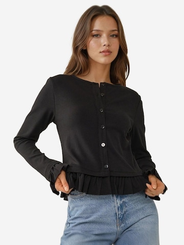 Hiccup Strickjacke in Schwarz: Vorderseite