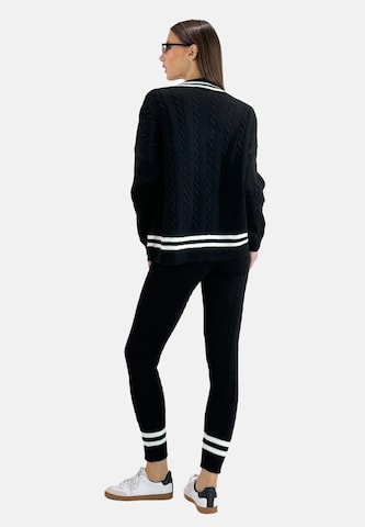 Elara Huispak in Zwart