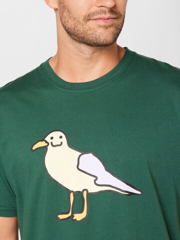 Maglietta 'Smile Gull' di Cleptomanicx in verde