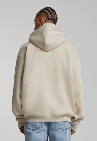 Veste de survêtement 'Essential' Karl Kani en beige