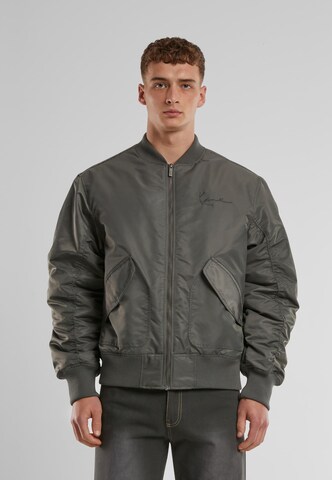 Karl Kani Between-season jacket 'Distressed' in Grey: front