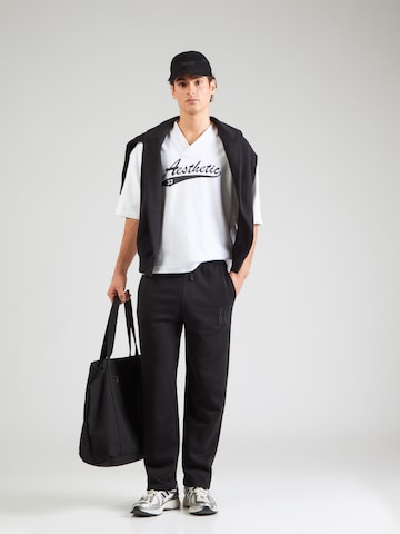 melns GAP Pakapēniski sašaurināts piegriezums Bikses