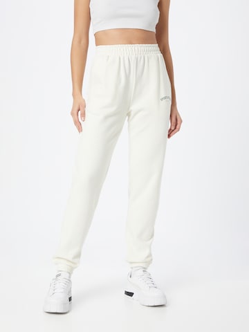 Effilé Pantalon de sport Athlecia en blanc : devant