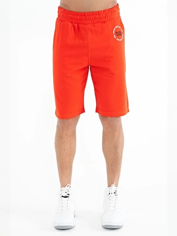 Tommy Life - Regular Calças em laranja: frente