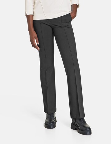 GERRY WEBER Boot cut Trousers with creases in Black: front