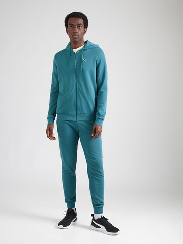 Survêtement 'Essentials Elevated' PUMA en vert : devant