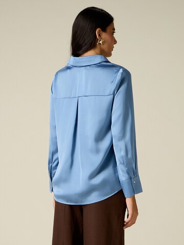 Camicia da donna di oltre in blu