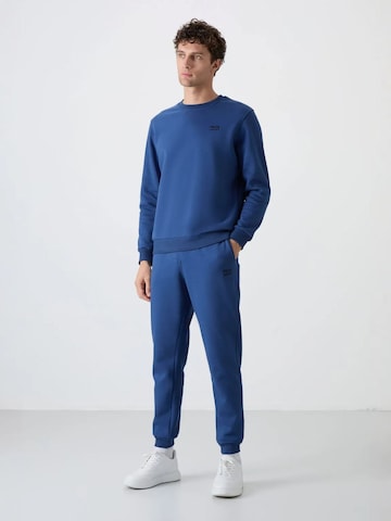 Survêtement Tommy Life en bleu : devant