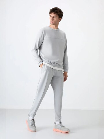Tuta da jogging di Tommy Life in grigio: frontale