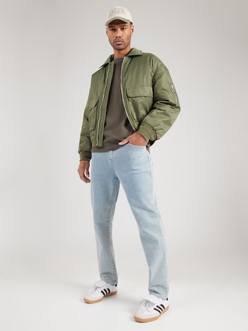 Tricou de la THE NORTH FACE pe verde