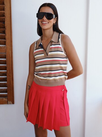 Next - Falda en rojo