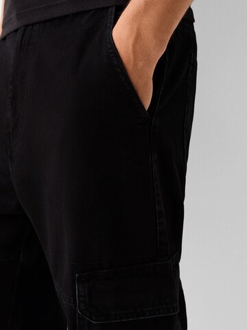 Bershka Loose fit Cargo jeans in Black
