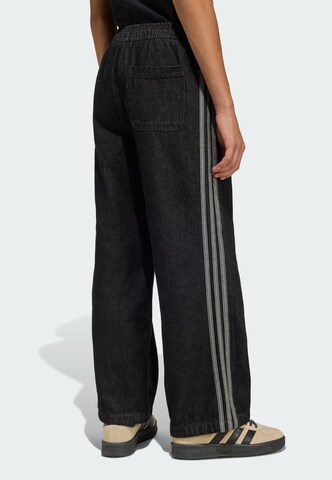 ADIDAS ORIGINALS - Pierna ancha Vaquero 'Firebird' en negro