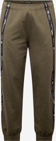 G-Star RAW Tapered Trousers in Green: front