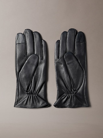 Mezzoguanti di Calvin Klein in nero