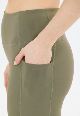 Athlecia Slimfit Tights 'Elli V2' in Grün
