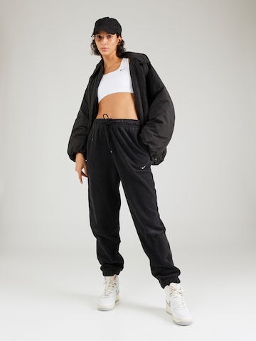 NIKE Tapered Sportbroek 'ONE' in Zwart